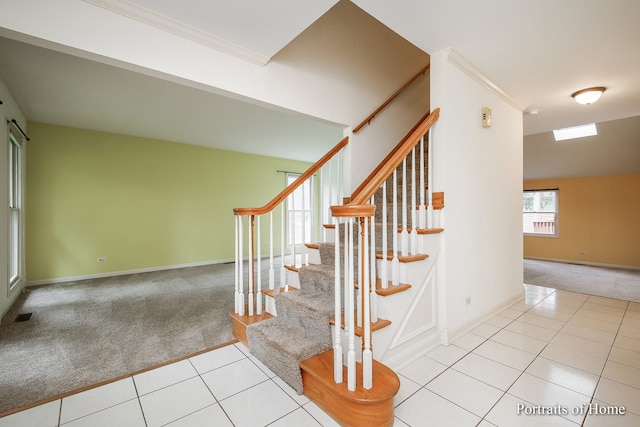 2755 Newport Dr, Naperville, IL 60565 - staircase with carpet floors, tile patterned flooring, and ornamental molding