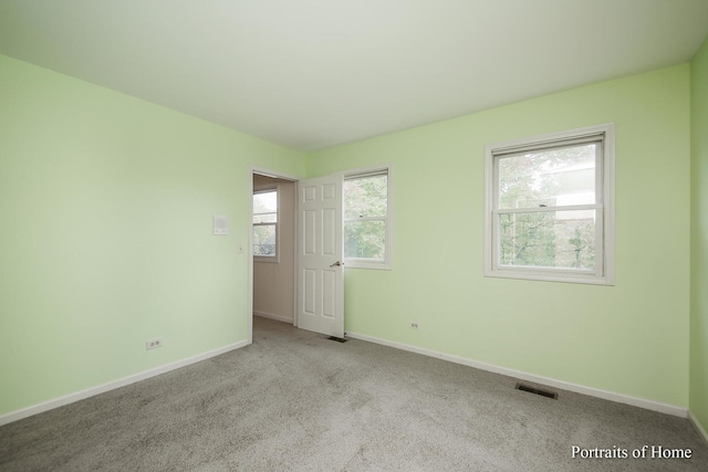 2755 Newport Dr, Naperville, IL 60565 - carpeted spare room featuring baseboards