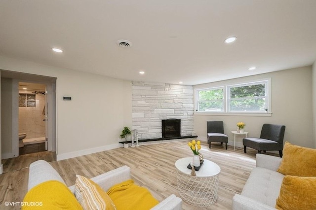 1134 N Dunton Ave, Arlington Heights, IL 60004 - living room featuring wood finished floors, a fireplace, recessed lighting, and baseboards