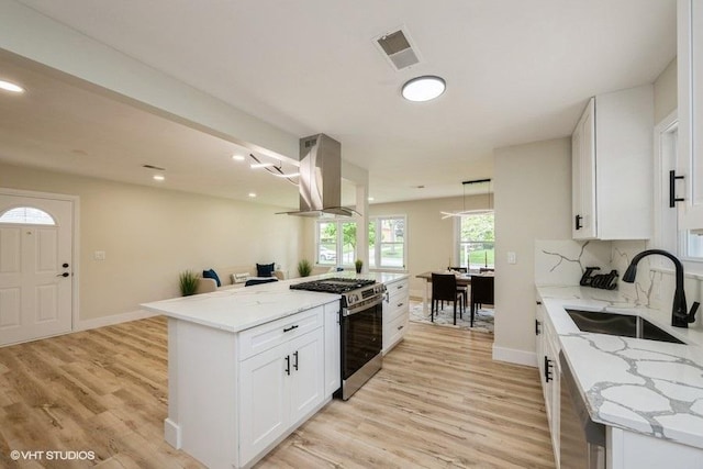 1134 N Dunton Ave, Arlington Heights, IL 60004 - kitchen with appliances with stainless steel finishes, island exhaust hood, a sink, light wood-type flooring, and light stone counters