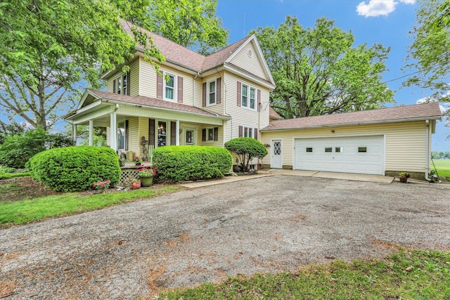 2385 County Road 1550, Saint Joseph, IL 61873 - victorian house featuring covered porch and driveway