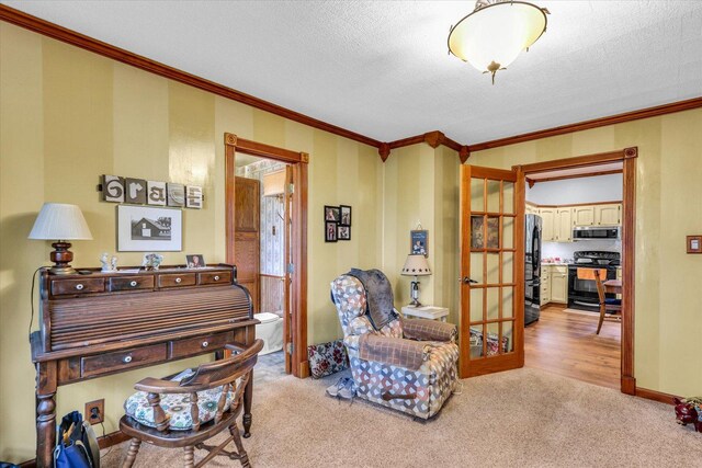 2385 County Road 1550, Saint Joseph, IL 61873 - sitting room with ornamental molding, light carpet, and french doors