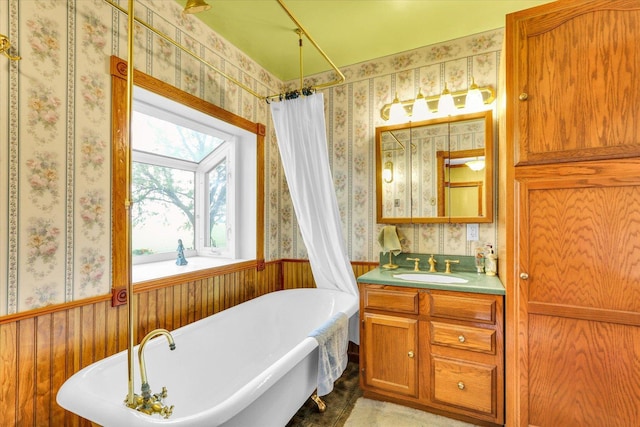 2385 County Road 1550, Saint Joseph, IL 61873 - bathroom with wallpapered walls, a soaking tub, vanity, and a shower with shower curtain