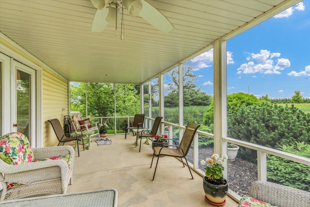 2385 County Road 1550, Saint Joseph, IL 61873 - sunroom / solarium with ceiling fan and view of scattered trees