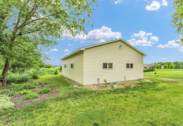 2385 County Road 1550, Saint Joseph, IL 61873 - view of home's exterior with a yard