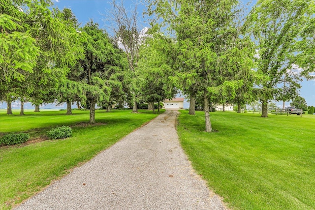 2385 County Road 1550, Saint Joseph, IL 61873 - view of front of home featuring asphalt driveway and a front yard