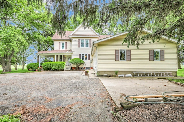 2385 County Road 1550, Saint Joseph, IL 61873 - victorian house featuring driveway and a porch