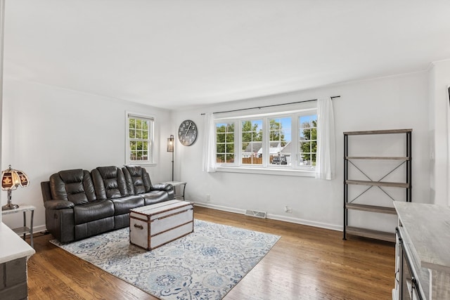 6200 N Overhill Ave, Chicago, IL 60631 - living room featuring wood finished floors, baseboards, and crown molding
