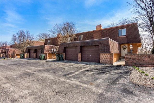199 W Lake Cook Rd, Palatine, IL 60074 - front facade featuring a chimney and brick siding