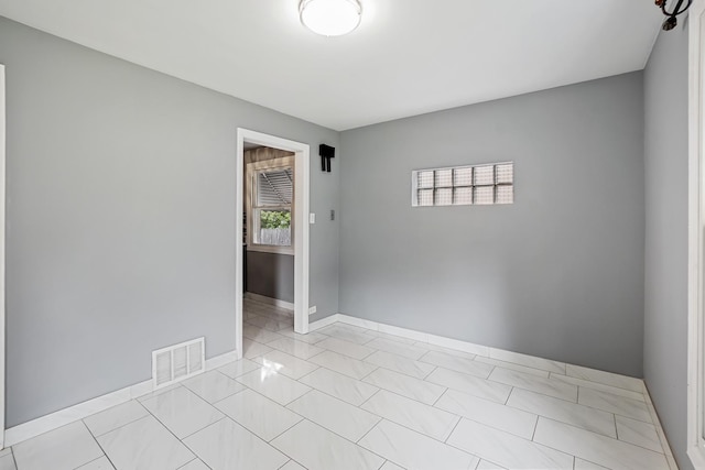 2640 Westbrook Dr, Franklin Park, IL 60131 - empty room with baseboards and light marble finish flooring