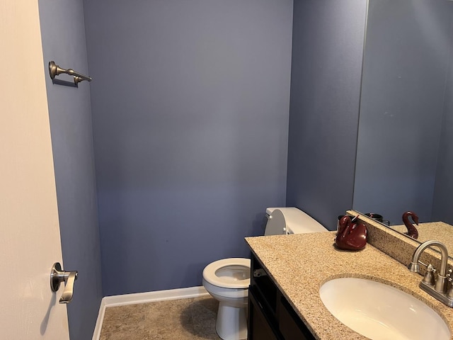 900 Windstone Ct, Lake In The Hills, IL 60156 - bathroom featuring toilet, vanity, and baseboards