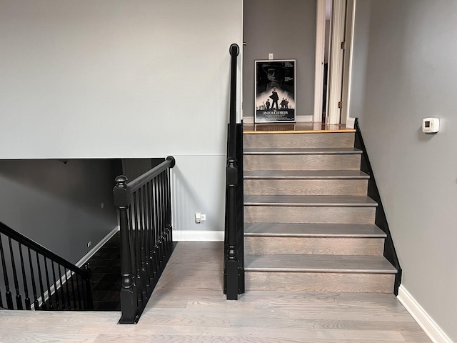 900 Windstone Ct, Lake In The Hills, IL 60156 - stairway featuring wood finished floors and baseboards