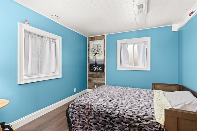 25516 W Gateway Cir, Plainfield, IL 60585 - bedroom with wood finished floors, wooden ceiling, and baseboards