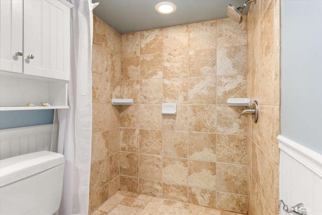 25516 W Gateway Cir, Plainfield, IL 60585 - full bathroom with a tile shower, a wainscoted wall, and toilet