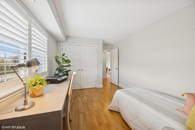 17 N Madison Ave Unit 4, La Grange, IL 60525 - bedroom featuring light wood-style flooring, a closet, and baseboards