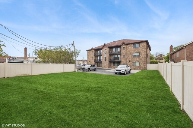 17 N Madison Ave Unit 4, La Grange, IL 60525 - back of house with uncovered parking and brick siding