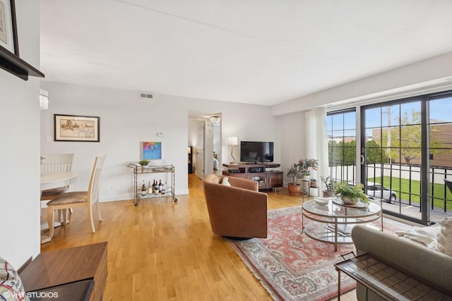 17 N Madison Ave Unit 4, La Grange, IL 60525 - living room featuring light wood-style flooring and baseboards