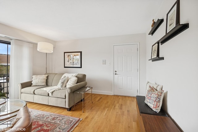 17 N Madison Ave Unit 4, La Grange, IL 60525 - living room featuring light wood finished floors and baseboards