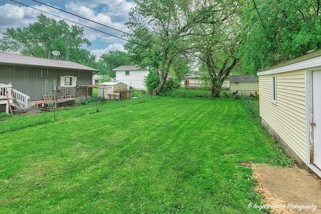 1720 Rogers Ave, Mchenry, IL 60050 - view of yard featuring a deck