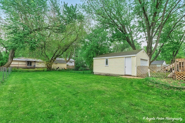 1720 Rogers Ave, Mchenry, IL 60050 - view of yard with an outdoor structure and a garage