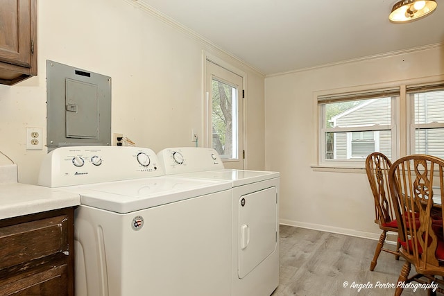 1720 Rogers Ave, Mchenry, IL 60050 - laundry room with electric panel, crown molding, light wood-type flooring, cabinet space, and healthy amount of natural light