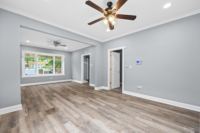 8425 S Essex Ave, Chicago, IL 60617 - spare room with ornamental molding, ceiling fan, wood finished floors, baseboards, and recessed lighting