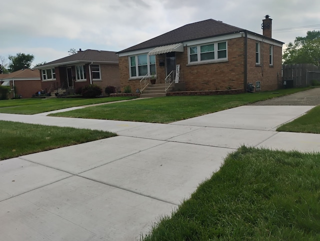 1424 Jerele Ave, Berkeley, IL 60163 - view of front of house with brick siding and a chimney