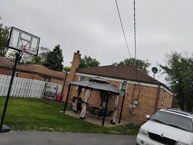 1424 Jerele Ave, Berkeley, IL 60163 - exterior space with a gazebo, brick siding, a chimney, and a patio