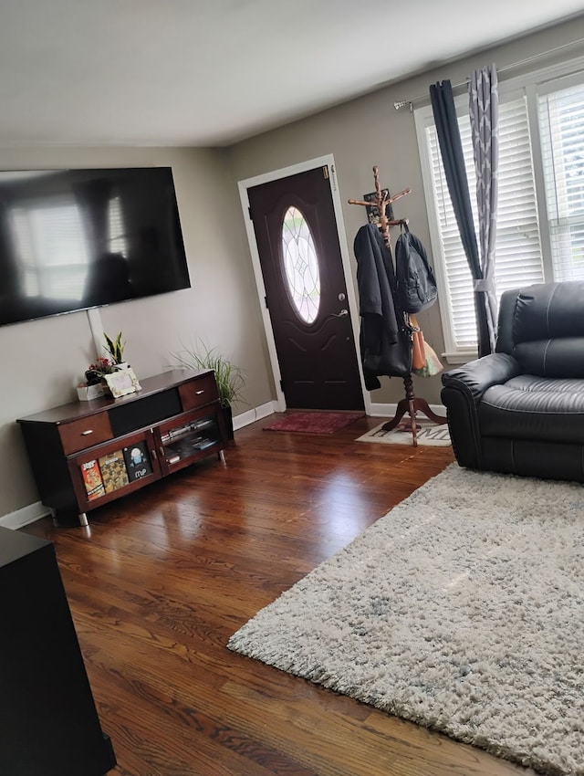 1424 Jerele Ave, Berkeley, IL 60163 - living area featuring healthy amount of natural light, wood finished floors, and baseboards