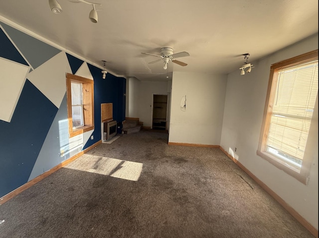 705 Campbell St, Joliet, IL 60435 - unfurnished living room featuring carpet floors, ceiling fan, and plenty of natural light