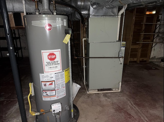 705 Campbell St, Joliet, IL 60435 - utility room featuring gas water heater and heating unit