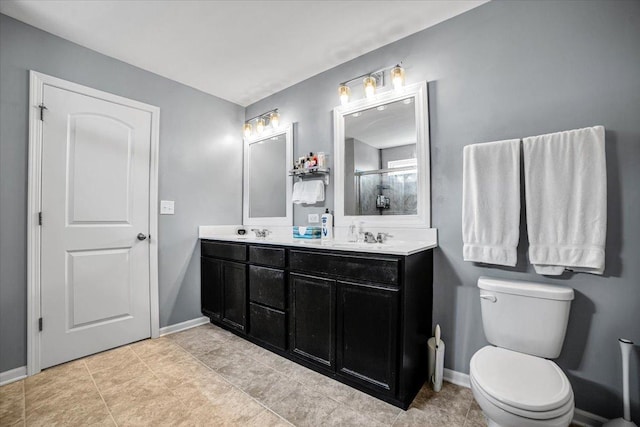 1651 Glenbrooke Ln, New Lenox, IL 60451 - bathroom featuring double vanity, baseboards, a shower with shower door, and toilet