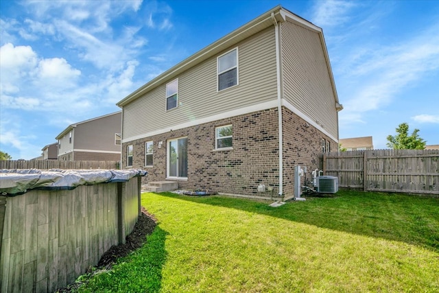 1651 Glenbrooke Ln, New Lenox, IL 60451 - back of property featuring brick siding and central AC unit