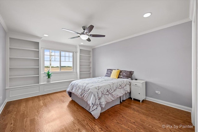 195 E Clover Ave, Cortland, IL 60112 - bedroom featuring crown molding, wood finished floors, baseboards, ceiling fan, and recessed lighting