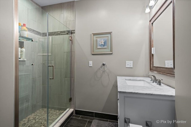 195 E Clover Ave, Cortland, IL 60112 - full bath with vanity, a stall shower, and baseboards