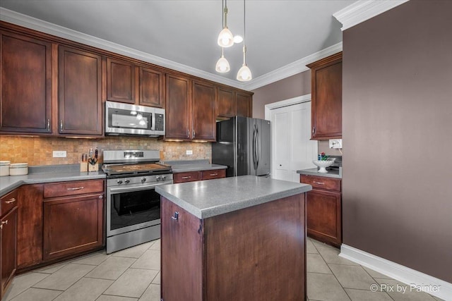 195 E Clover Ave, Cortland, IL 60112 - kitchen featuring appliances with stainless steel finishes, light tile patterned floors, ornamental molding, tasteful backsplash, and a kitchen island