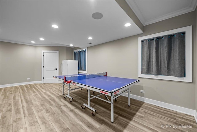 195 E Clover Ave, Cortland, IL 60112 - game room with crown molding, recessed lighting, baseboards, and light wood-style floors