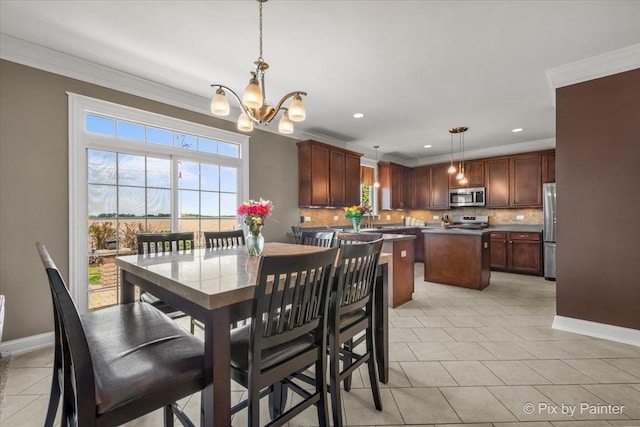 195 E Clover Ave, Cortland, IL 60112 - dining space featuring healthy amount of natural light, a chandelier, baseboards, crown molding, and recessed lighting
