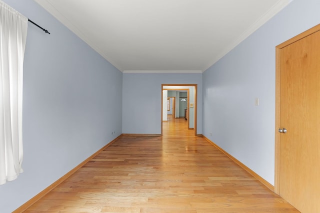 405 S Harvey Ave Unit 2A, Oak Park, IL 60302 - empty room featuring light wood-style flooring, ornamental molding, and baseboards