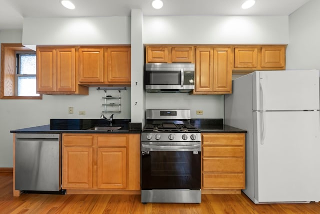405 S Harvey Ave Unit 2A, Oak Park, IL 60302 - kitchen featuring appliances with stainless steel finishes, a sink, light wood finished floors, and recessed lighting