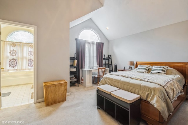 5932 N Sauganash Ln, Chicago, IL 60646 - bedroom featuring multiple windows, vaulted ceiling, light colored carpet, and ensuite bath