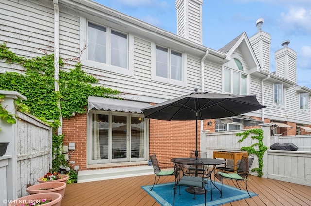 5932 N Sauganash Ln, Chicago, IL 60646 - deck featuring outdoor dining area