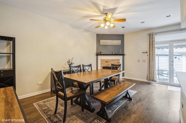 5932 N Sauganash Ln, Chicago, IL 60646 - dining area featuring wood finished floors, ceiling fan, baseboards, and a brick fireplace