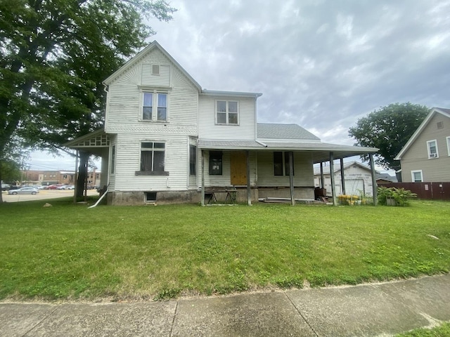 131 S 3rd St, Oregon, IL 61061 - view of front facade with covered porch and a front lawn