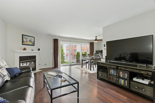 7811 W 157th St Unit 2N, Orland Park, IL 60462 - living room with ceiling fan, a fireplace with flush hearth, and wood finished floors