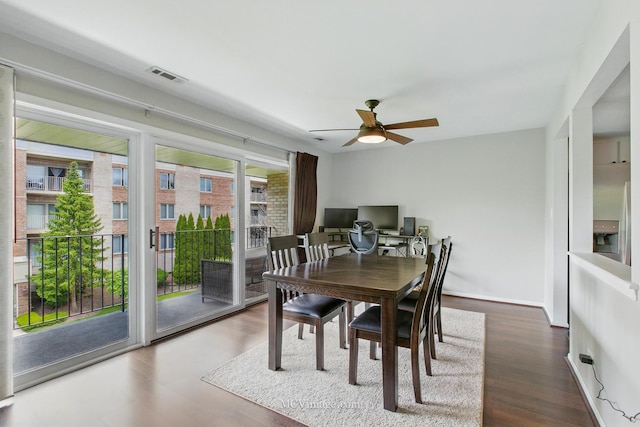 7811 W 157th St Unit 2N, Orland Park, IL 60462 - dining area featuring a ceiling fan, wood finished floors, and baseboards