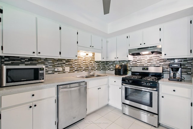 7811 W 157th St Unit 2N, Orland Park, IL 60462 - kitchen with appliances with stainless steel finishes, under cabinet range hood, a sink, and light countertops