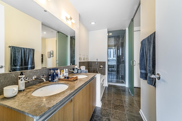 600 N Fairbanks Ct Unit 2503, Chicago, IL 60611 - full bath with double vanity, a shower stall, stone finish flooring, decorative backsplash, and recessed lighting