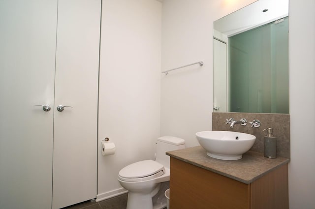 600 N Fairbanks Ct Unit 2503, Chicago, IL 60611 - bathroom with vanity, toilet, and backsplash