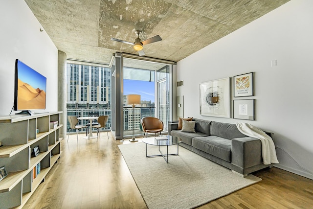 600 N Fairbanks Ct Unit 2503, Chicago, IL 60611 - living area featuring floor to ceiling windows, a ceiling fan, and wood finished floors